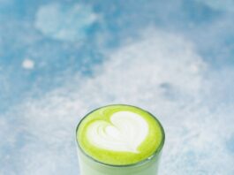 close up photo of glass of matcha drink